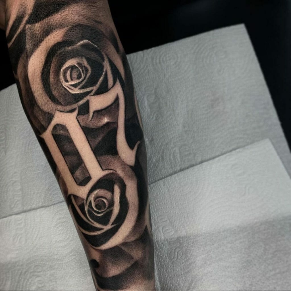 Black And Grey Rose Hand Tattoo