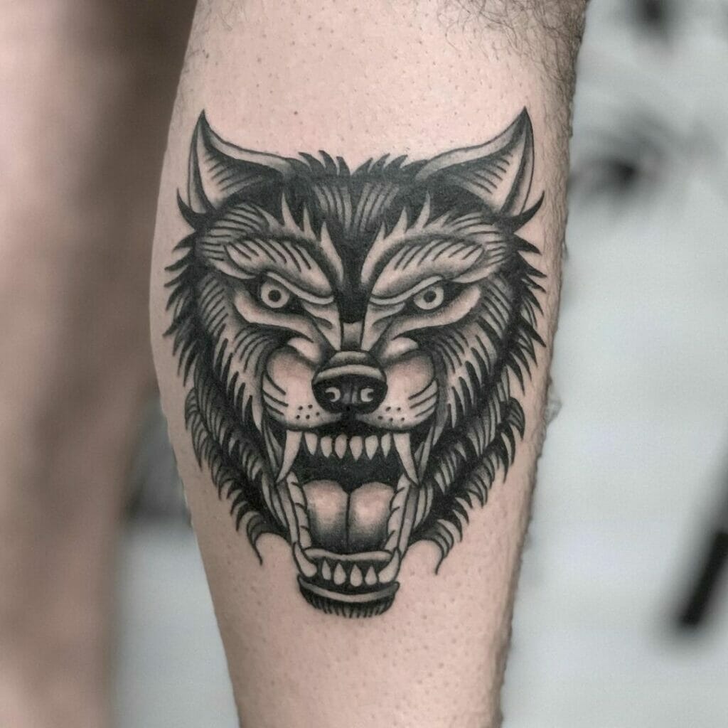 Black Traditional Wolf Head Tattoo
