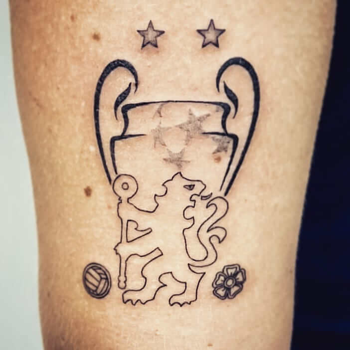 Champions League Trophy And Chelsea Logo Tattoo