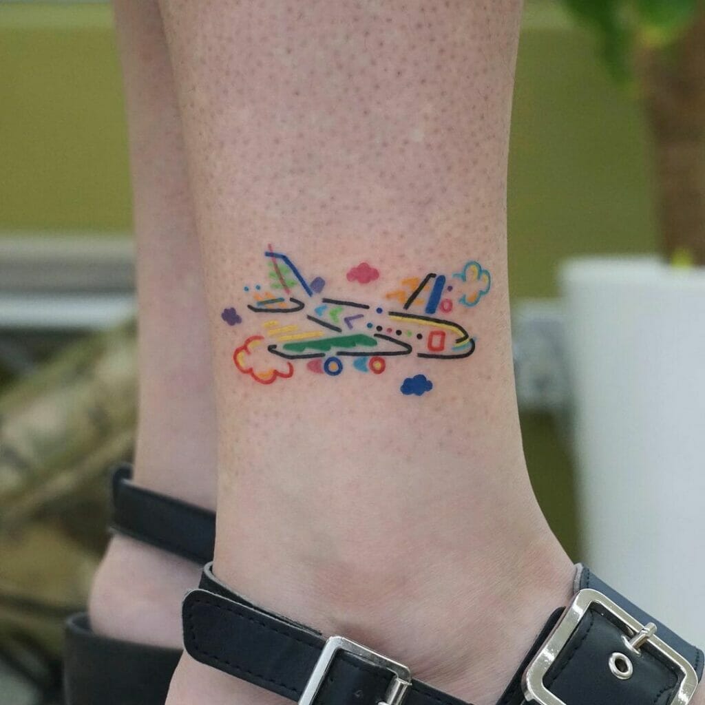 Colourful Aeroplane Travel Tattoo