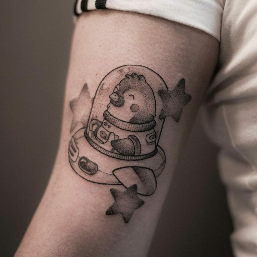 Cute Spaceship Penguin Tattoo