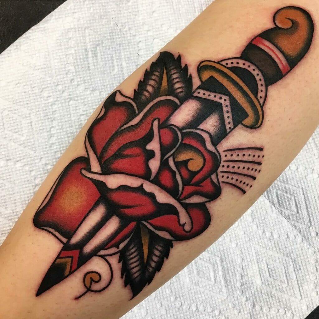 Dark And Bold Dagger And Red Rose Tattoo