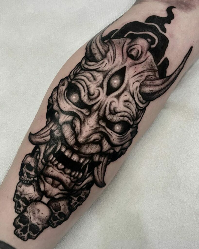 Dark Forearm Oni Mask Tattoo