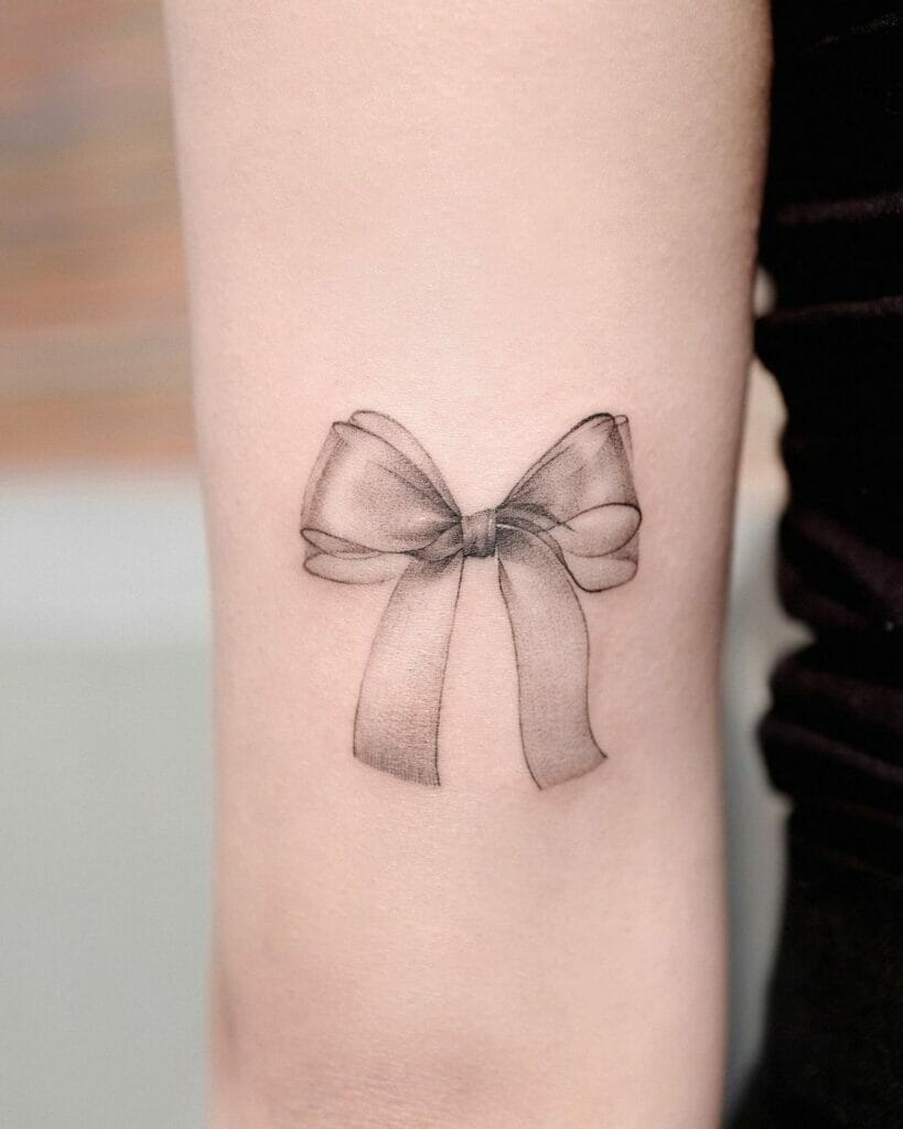 Delicate Black And Grey Ribbon Tattoos