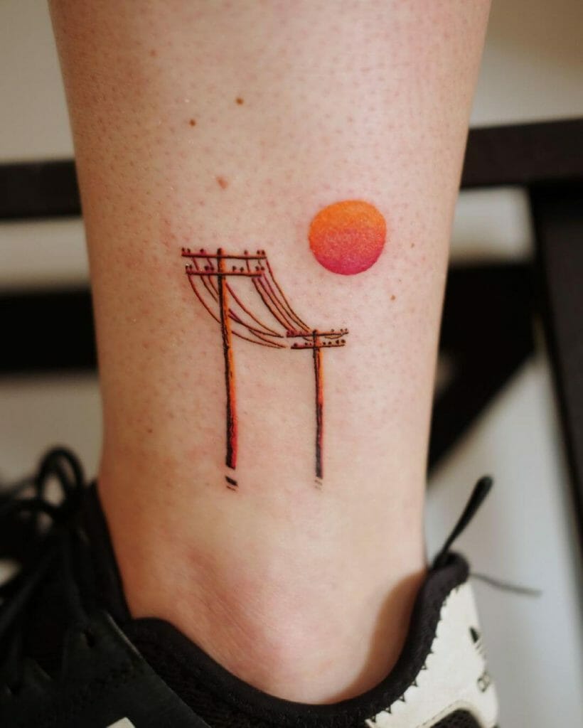 Electric Poles And A Setting Sun Tattoo