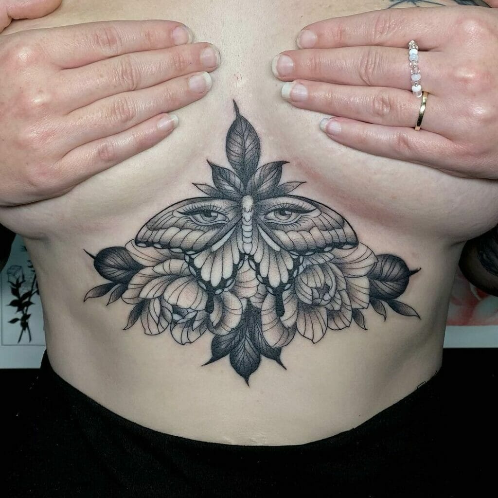 Enigmatic Moth With Flower Sternum Tattoos