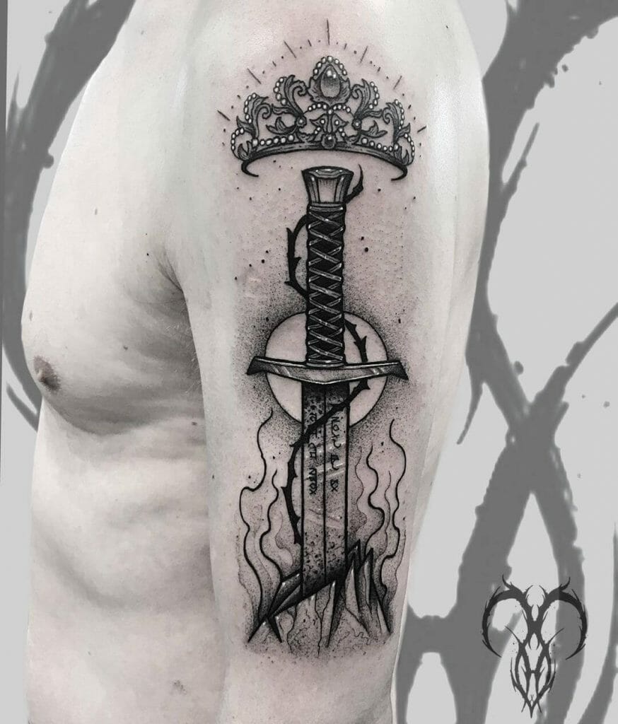 Enormous Crown And Sword Excalibur Tattoo Arm