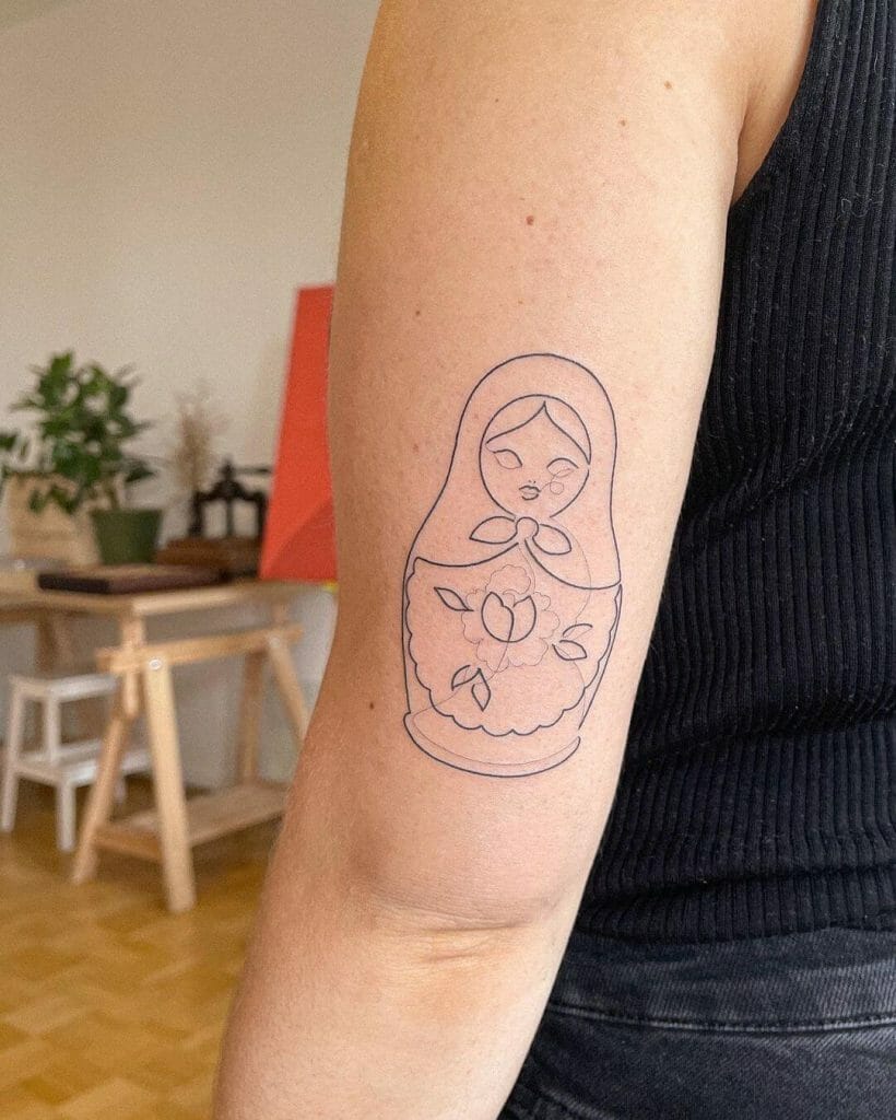 Fine Continuous Line Russian Doll Tattoo