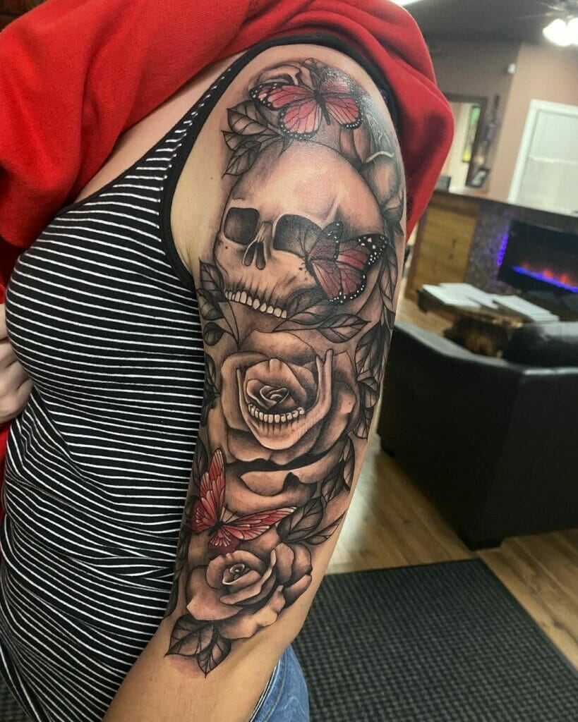 Floral Quarter Sleeve Tattoo With A Skull