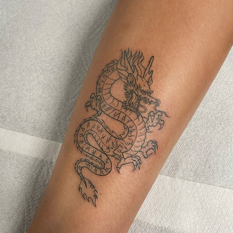Forearm Dragon Tattoo With Black Outlining