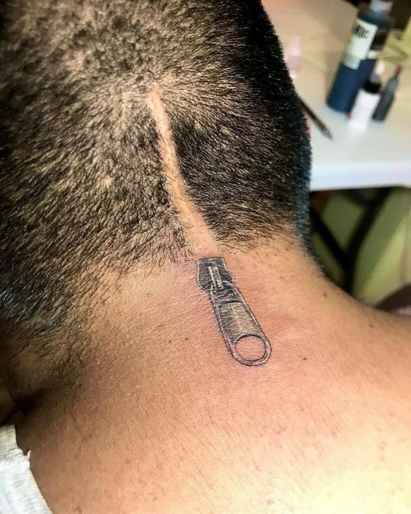 Grey Zipper Tattoo Behind The Head
