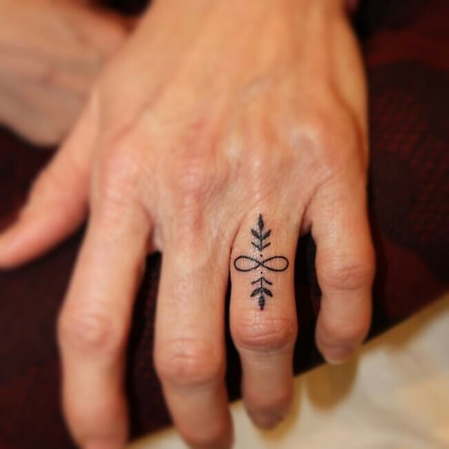 Infinity Sign Ring Finger Tattoo