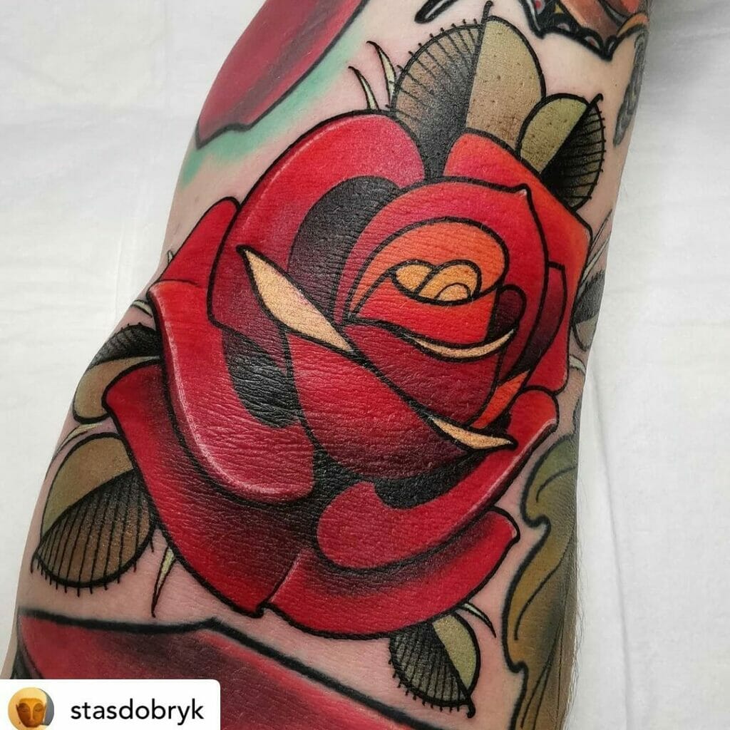 Large And Vibrant Traditional Red Rose Tattoo With Leaves
