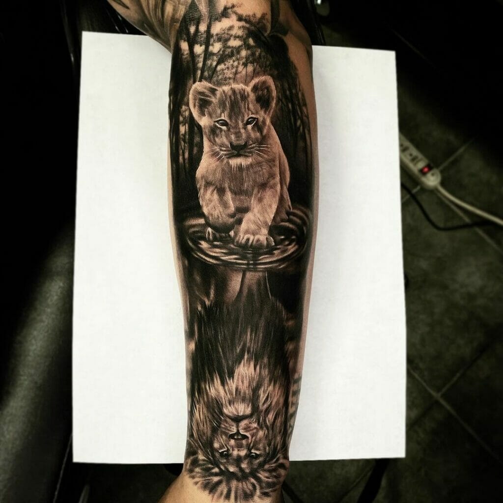 Lion Reflection Hand Tattoo