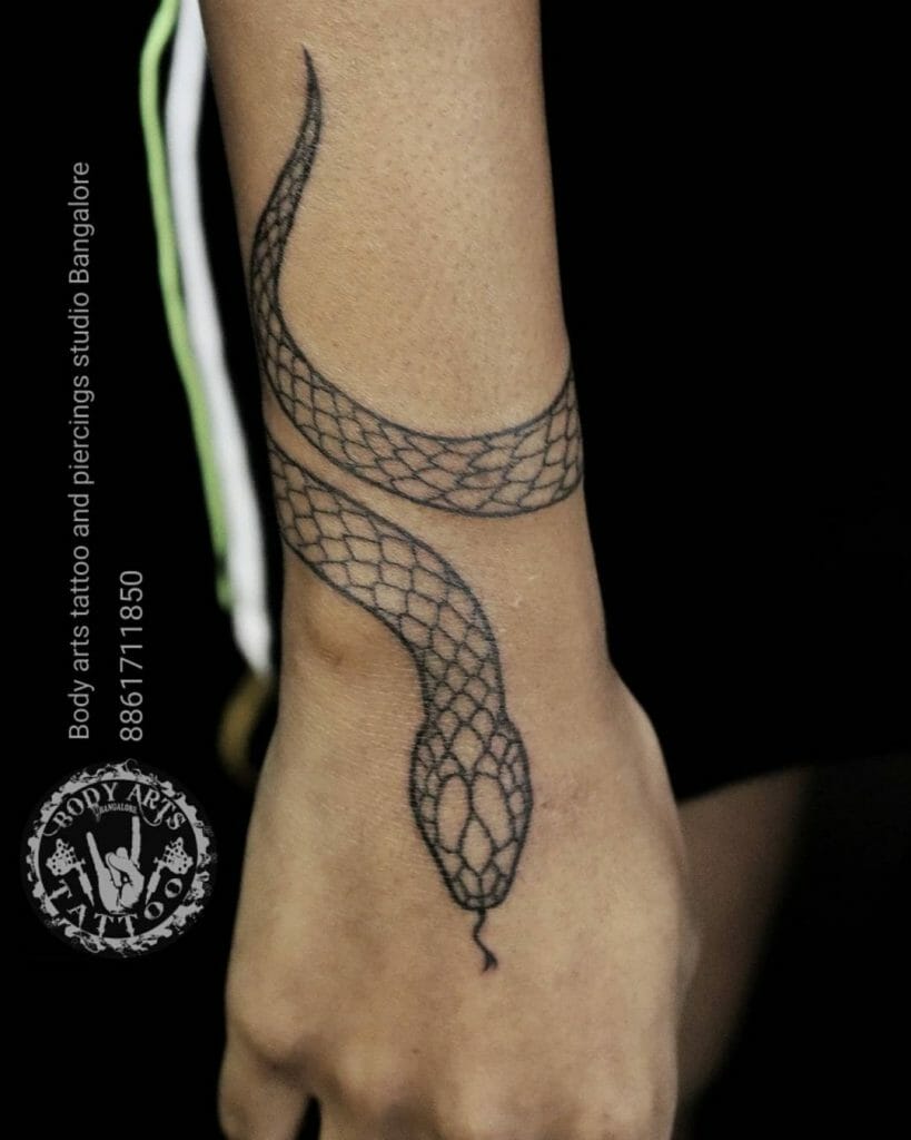 Minimalistic Small Snake Wrist Tattoo