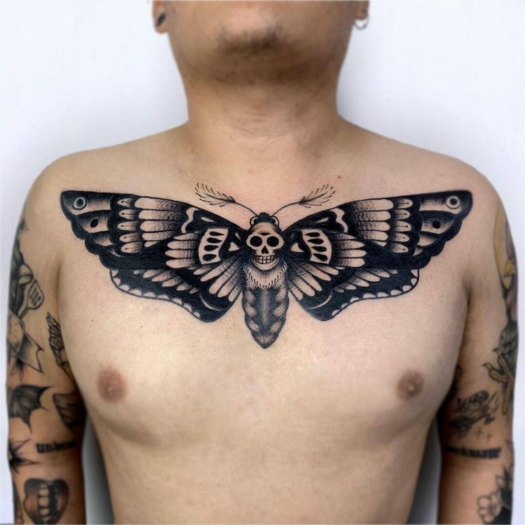 Moth & Skull Chest Tattoo