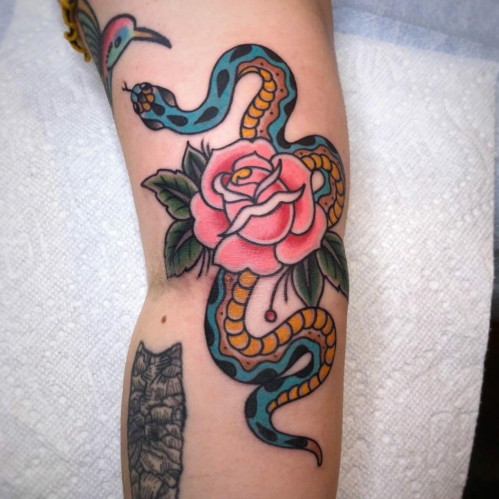 Multicoloured Serpent And Pink Rose snake tattoo design