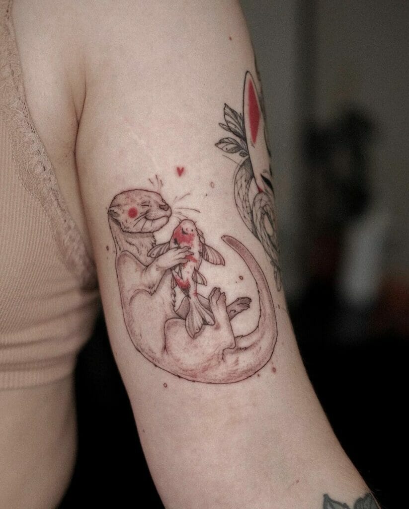 Otter Animal Holding A Fish Tattoo