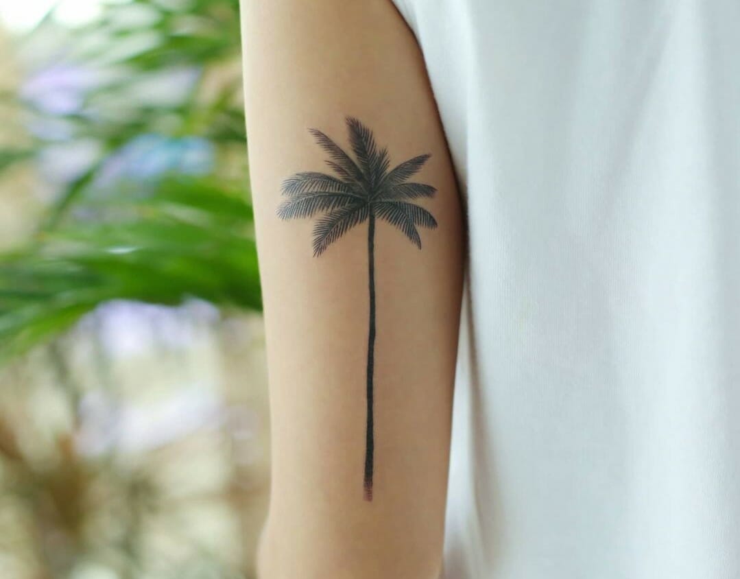 Blackwork palm tree tattoo on the left forearm  Palm tree tattoo Tattoos Tree  tattoo