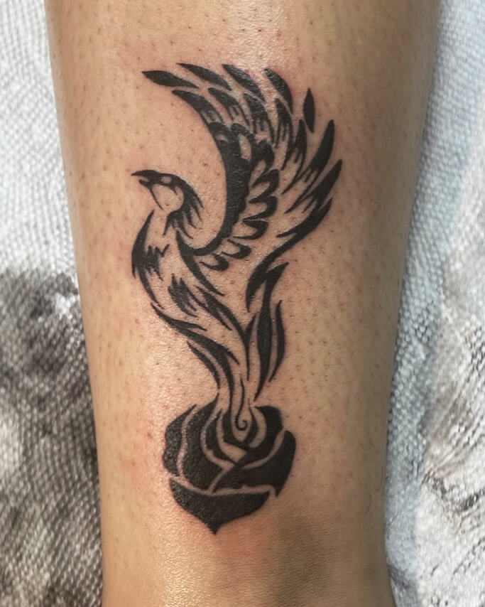 Phoenix Rising From A Rose Tattoo