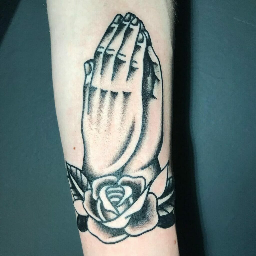 Religious Tattoos With The Praying Symbol