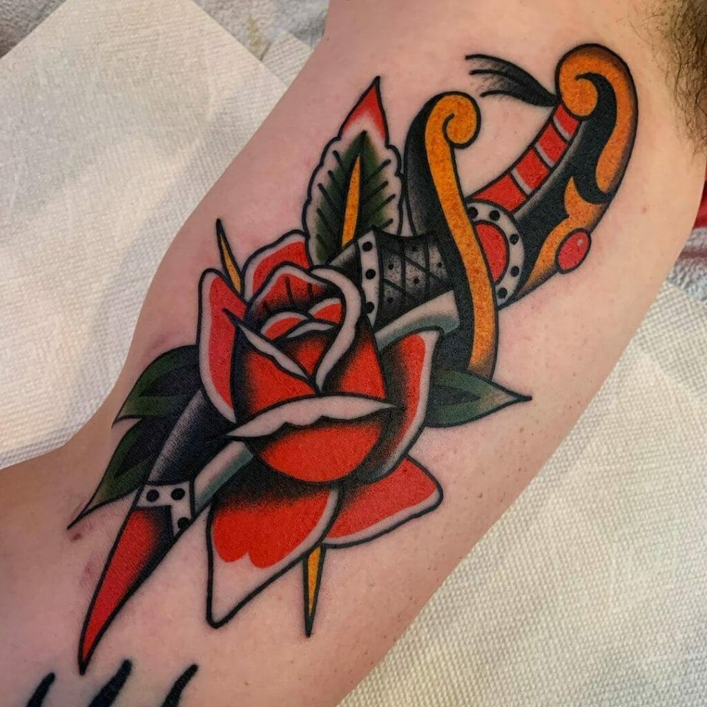 Rose And Dagger Tattoo