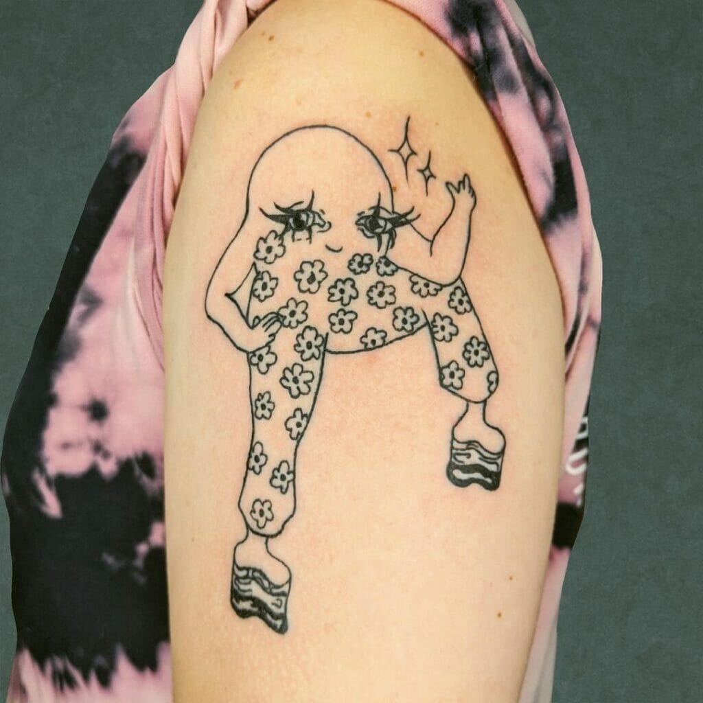 Sassy Upper Arm Tattoo