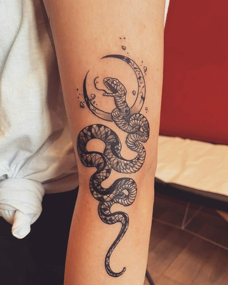 Serpent With Crescent Moon Tattoos Design