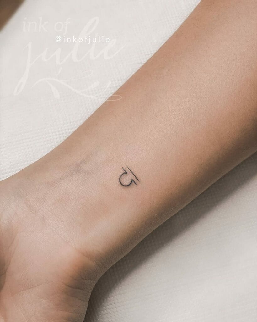 Simple Libra Zodiac Sign Wrist Tattoo