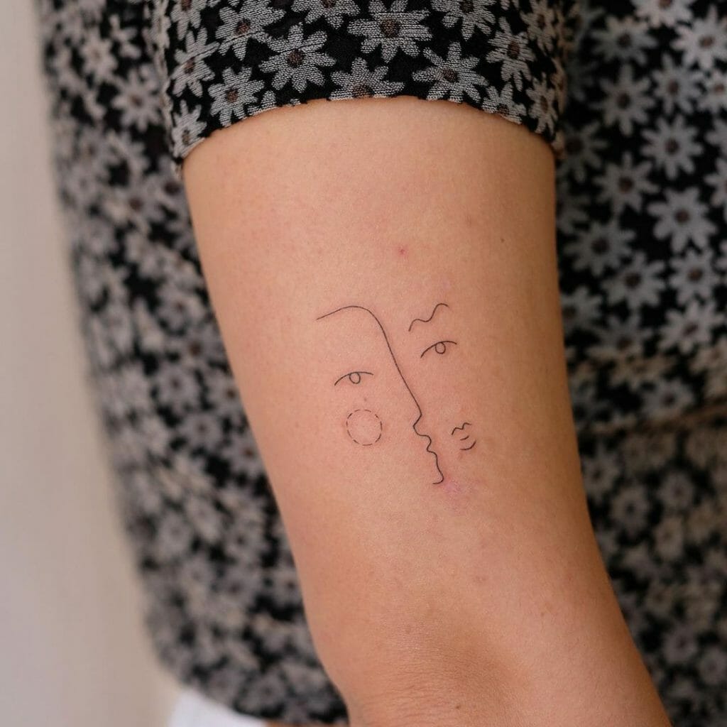 Simple Minimalistic Two Abstract Face Tattoo