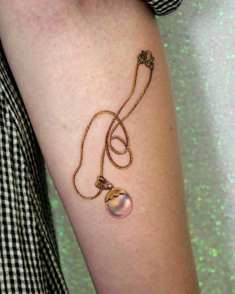 Simple Pearl Ornament Arm Tattoo