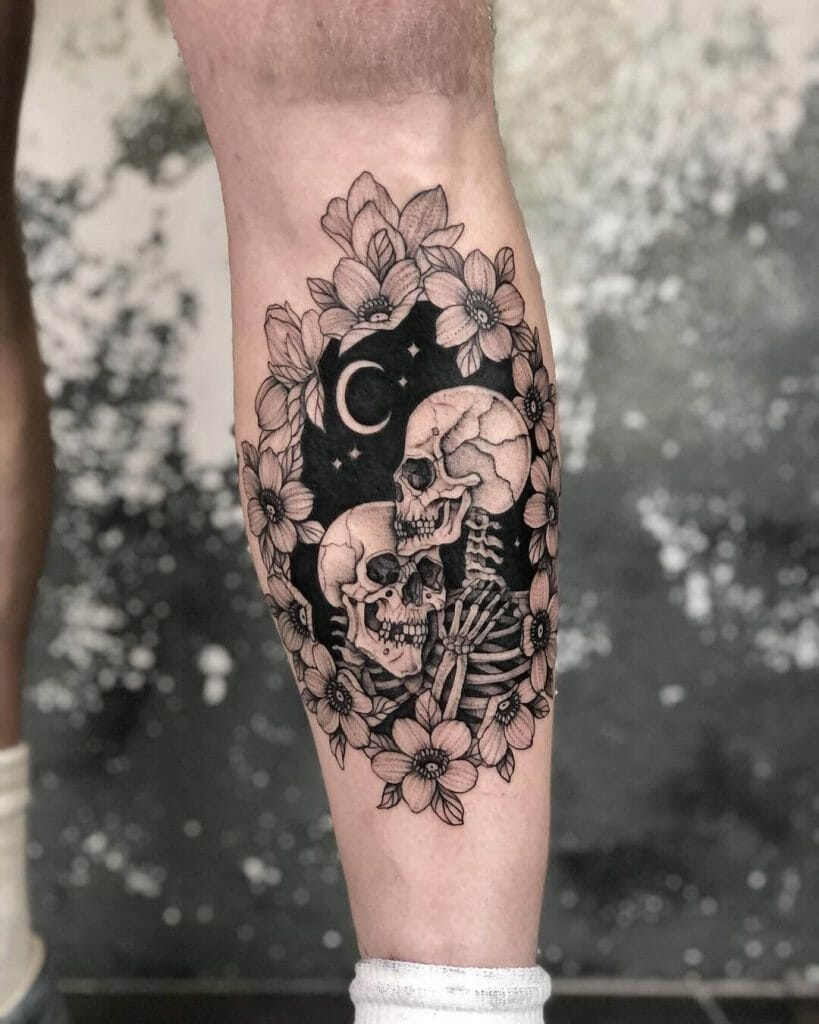 Skull In Floral Frame Half Sleeve Tattoo