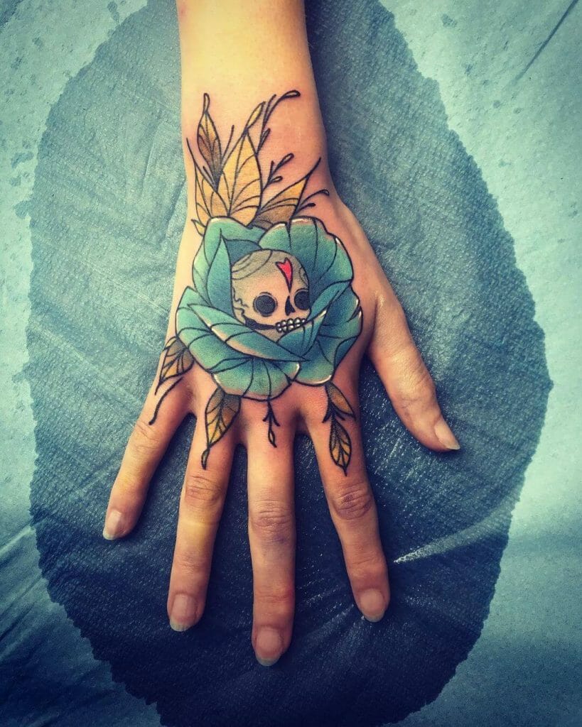 Skull Wrapped In A Blue Rose Tattoo Design