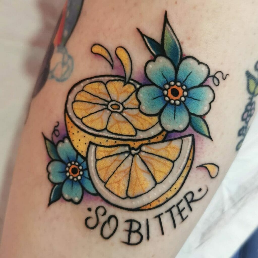 Sliced Lemon Wedges And Flowers Tattoo