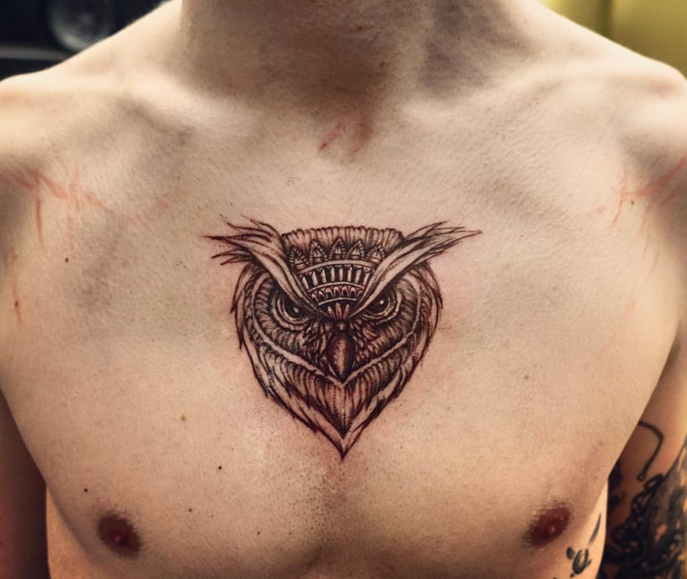 Small Owl Tattoo On Chest
