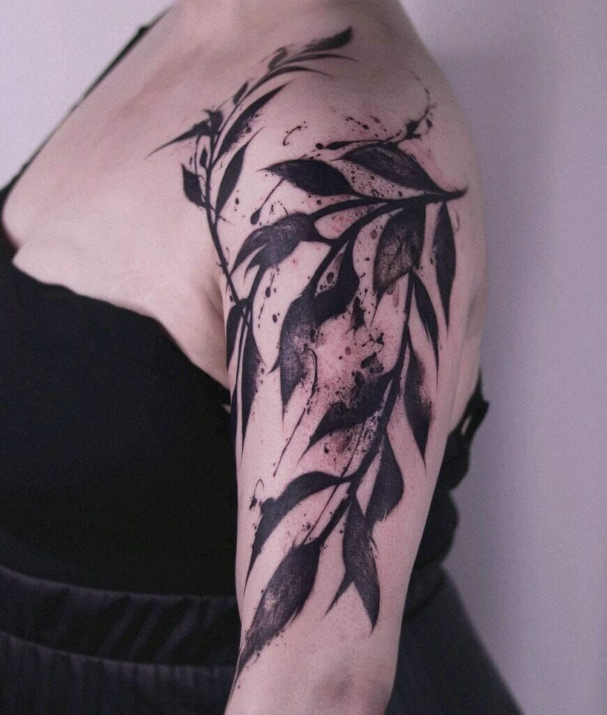Solid Black Leaf Shoulder Tattoo Design