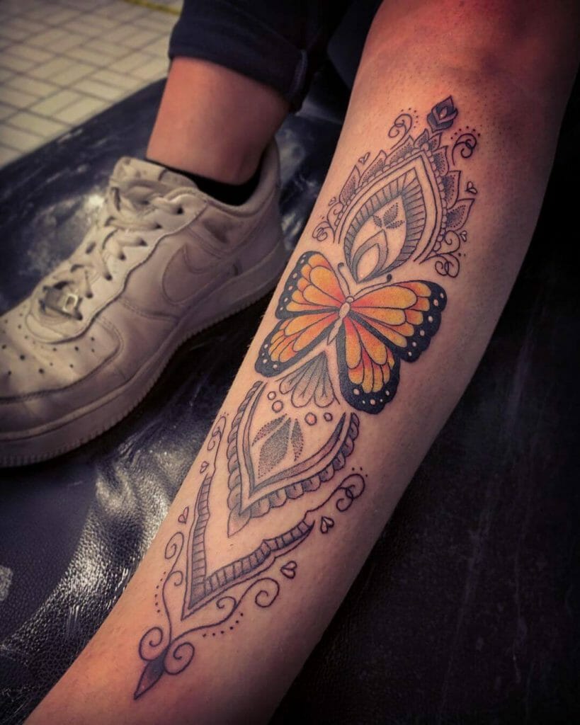 Solid Butterfly With Mandala Design Tattoo