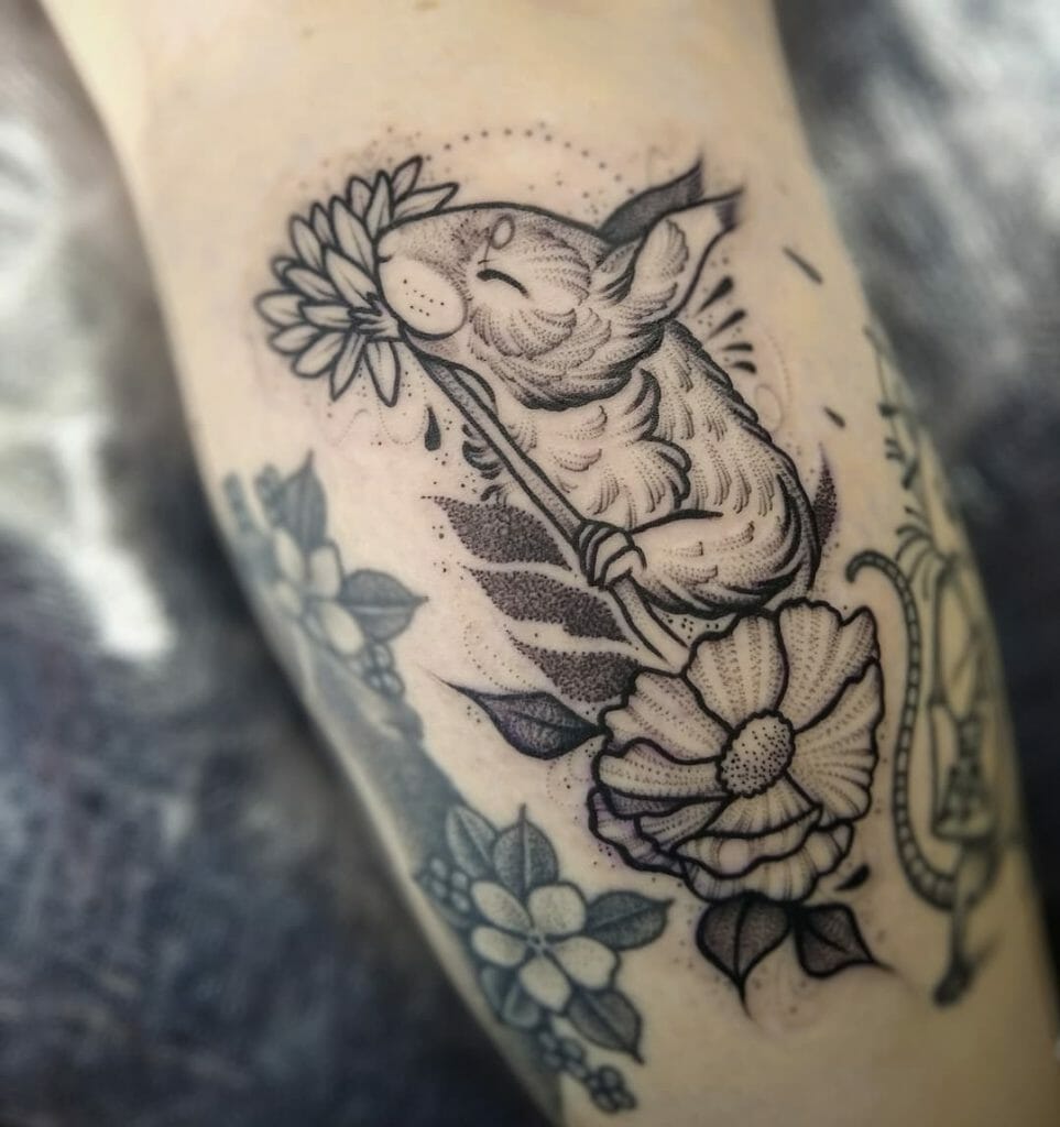 Squirrel Sniffing Flowers Tattoo