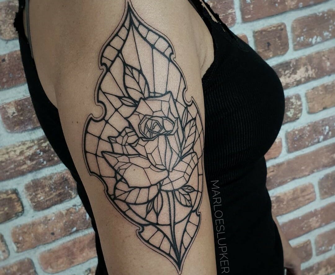 Stained glass tattoo on the shoulder blade