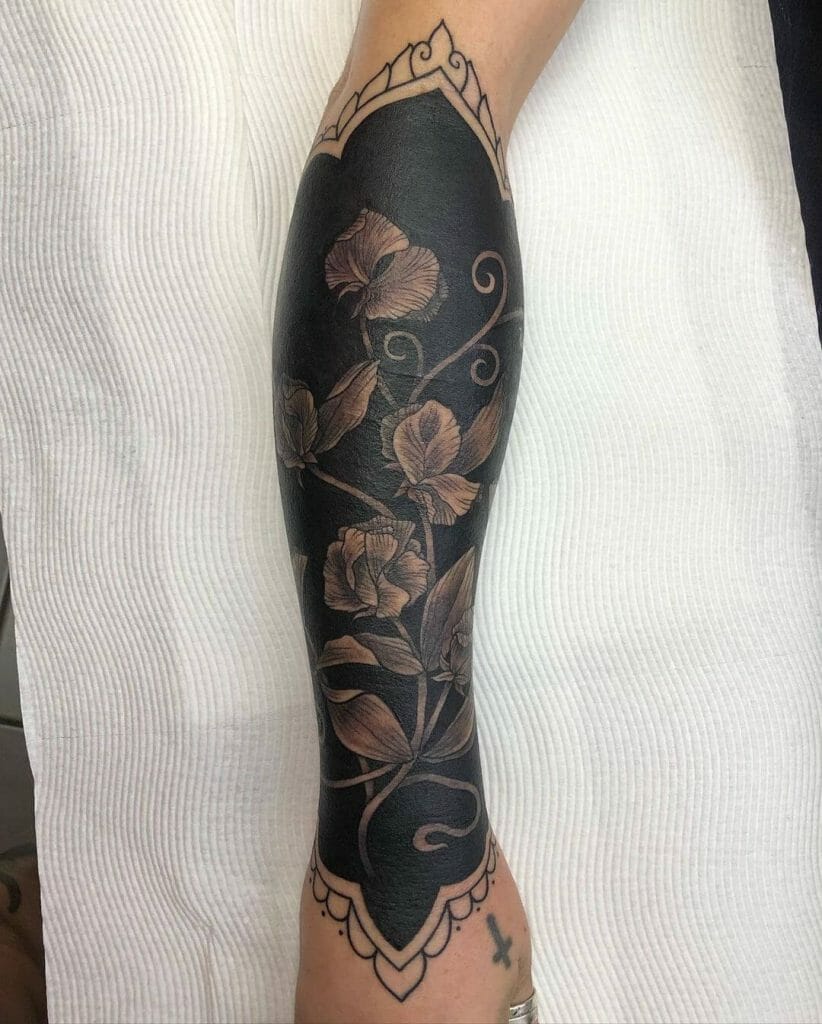 Sweet Pea Flowers Tattoo In Black