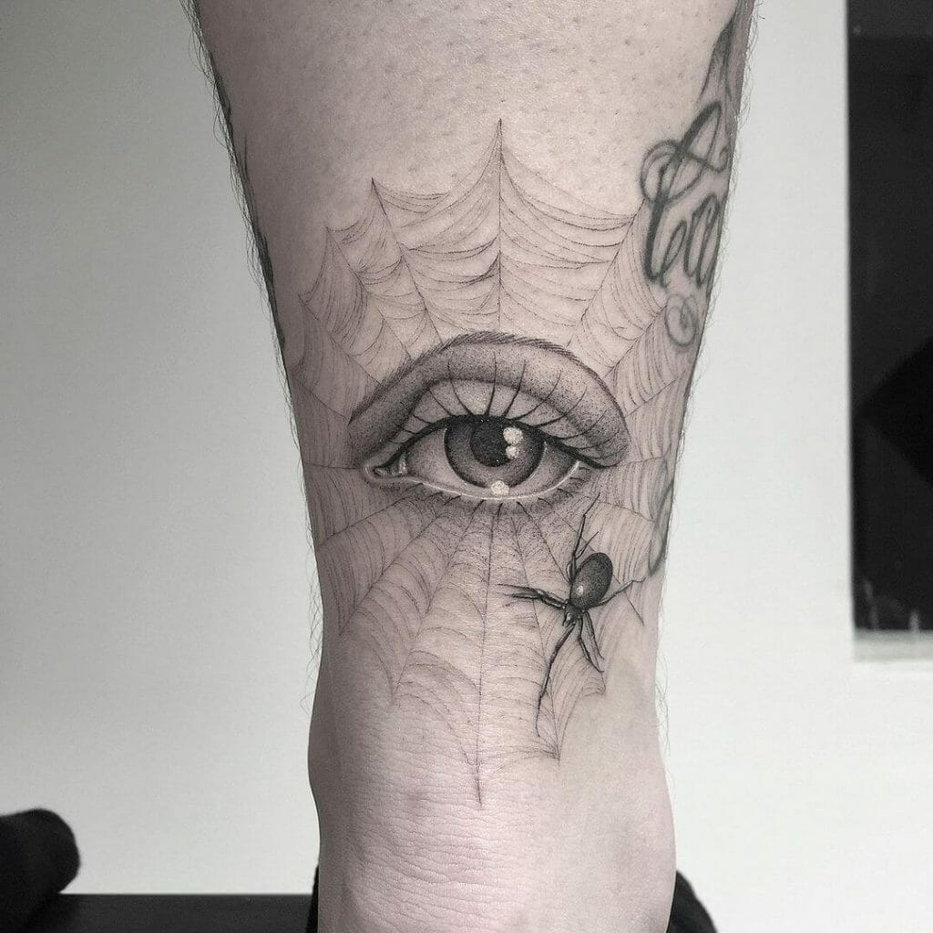 Teardrop Tattoo With Spider Web Tattoos