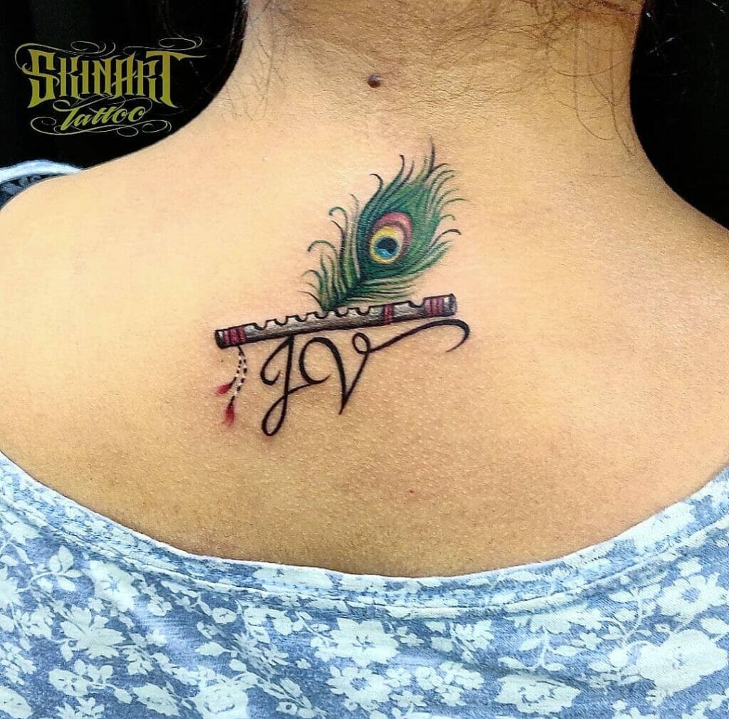 The Flute And Peacock Feather Tattoo