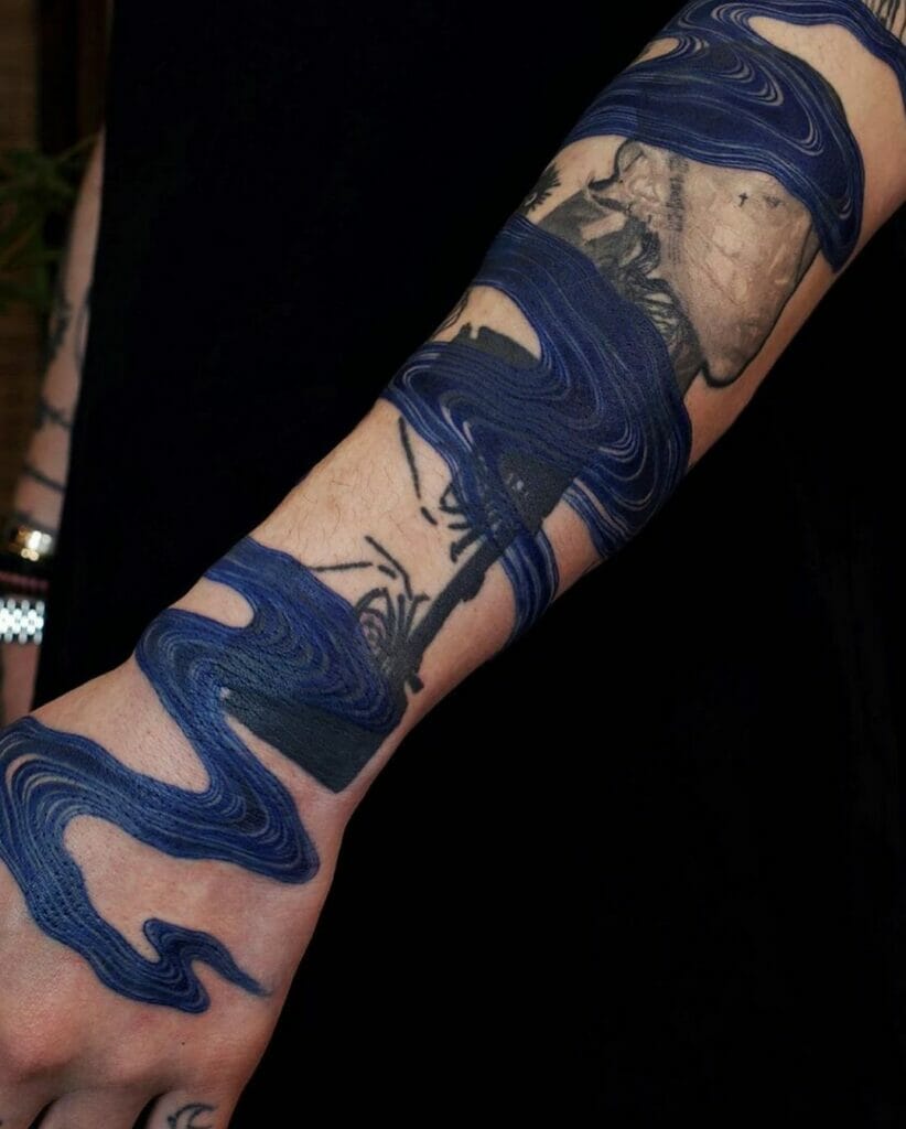 The Meaningful 'Human Mind Is Flowing' Blue River Tattoo For The Thinkers