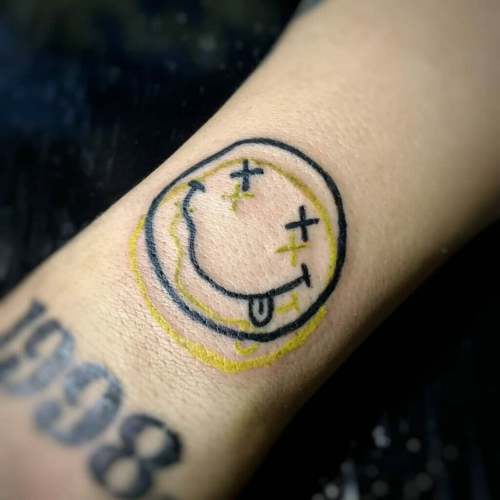 This Nirvana Smiley Face Tattoo