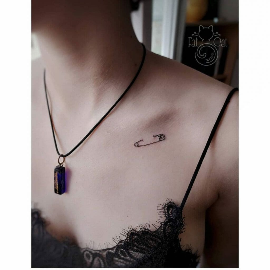 Tiny Safety Pin Tattoo Idea For Your Collarbone Area