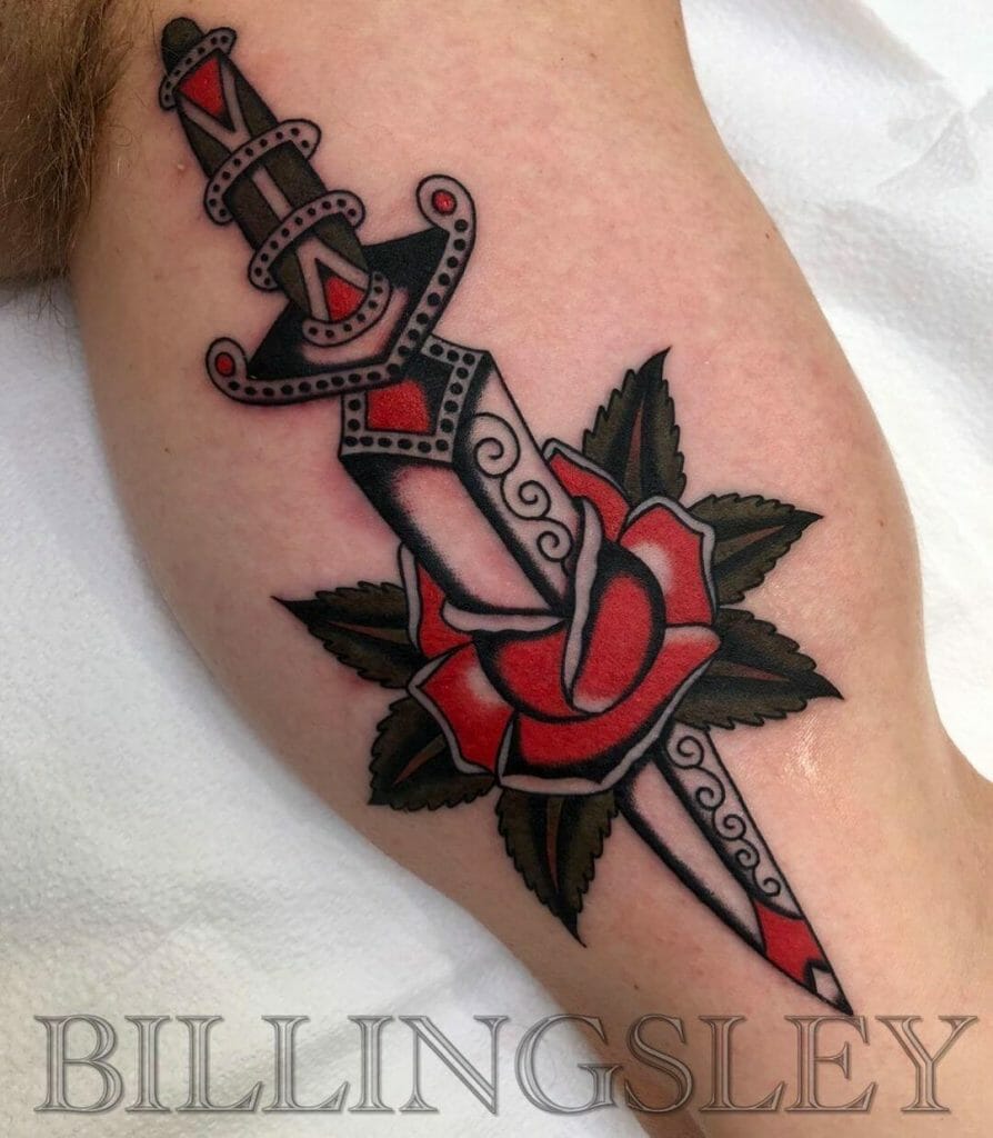 Traditional Rose And Dagger Tattoo