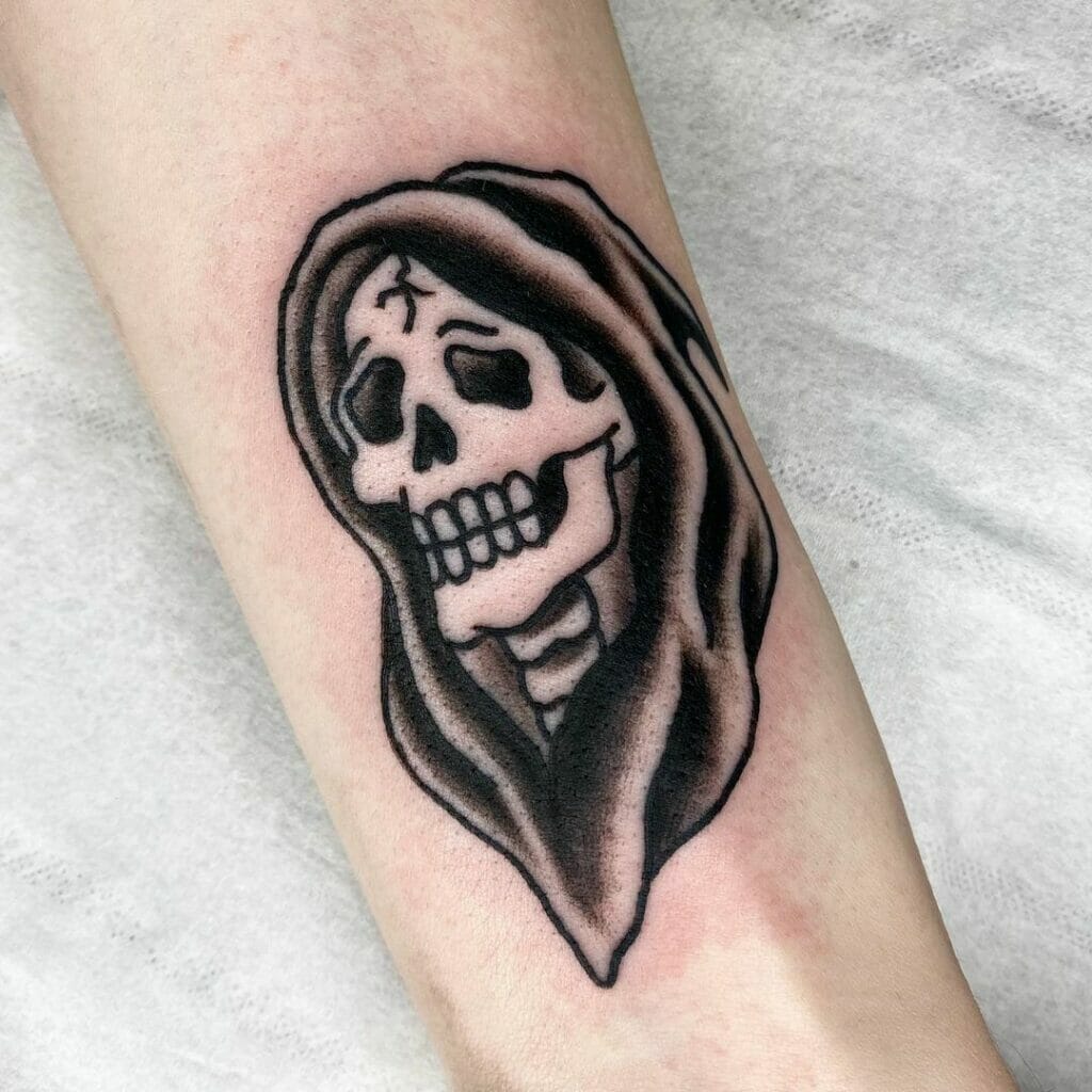 Traditional Skull Tattoo Featuring The Grim Reaper