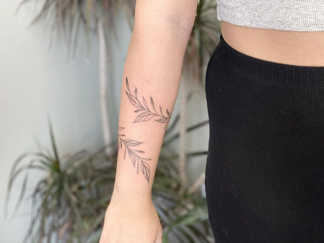 Minnie on Instagram Wrapping wildflower vine for Emily  Wrap around  tattoo Around arm tattoo Wrap around wrist tattoos