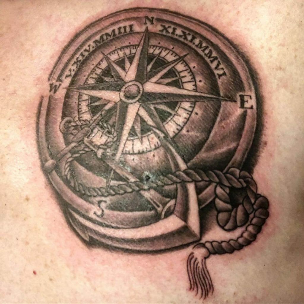 A Small Compass With Anchor Tattoo