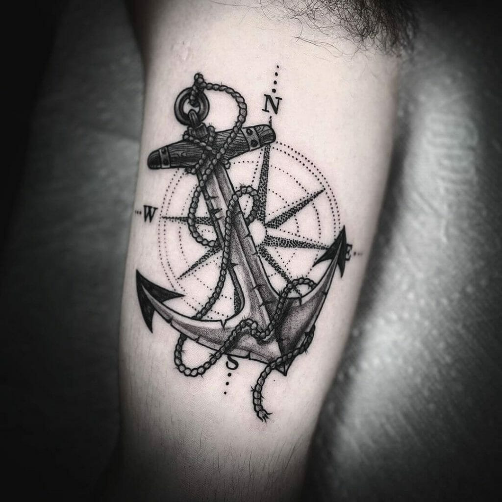 A Unique Anchor With Compass Tattoo